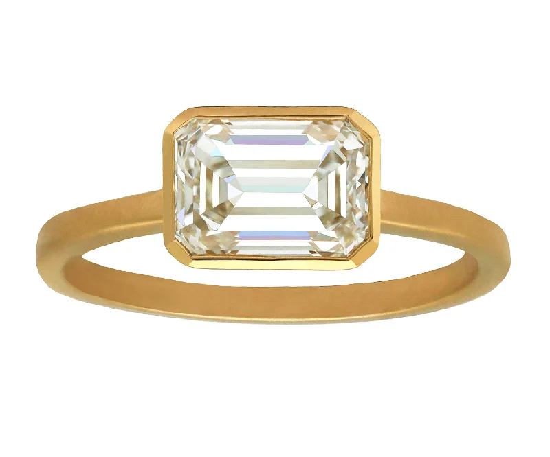 Shop Dazzling Jewelry At The Best Prices 1.50ct Emerald Cut Diamond Set East-West in Gold Bezel Ring